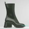 女性のベティポリ塩化ビニールの雨のブーツのゴム厚い半分のブーツトップデザイナーレディースプラットフォームヒールファッションブーツ