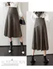 Automne hiver femmes jupes en cuir Pu demi-longueur jupe taille haute mi-longue jupe trapèze élégant épissage femmes vêtements 211119