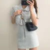 Vestidos de trabajo para mujer, conjunto de dos piezas de verano, estilo coreano, elegante, de un solo pecho, con borlas, camisetas de manga corta y minifalda ajustada de cintura alta