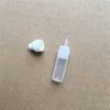 200 pezzi Mini 1 ml Bottiglia vuota con ago in plastica Punta lunga e sottile PET per bottiglie contagocce per succo liquido E con tappo a prova di bambino per olio DHL