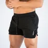 Pantalones cortos para correr 2021 Hombres sólidos Secado rápido Gimnasio Deporte Fitness Trotar Entrenamiento Deportes Pantalones cortos Casual279l