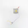 Personality Sewn label pendant casual socks cotton medium tube socks men's and women's sports socks