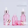 Garrafa de gotas de vidro rosa 5-100 ml de soro de luxo com tampa de ouro rosa Shinny para óleo essencial