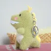 Söt koreansk dinosaur keychain mini tecknad plysch leksak docka keychain väska prydnad nyckel kedja tillbehör nyckelring för tjejer g1019