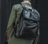 豪華なカジュアルな旅行バッグブラックPUレザーメンズショルダー女性スクールバッグ男性の帯電防止デザイナーバックパック