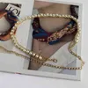 Cinture a catena di perle lavorate a maglia Cinture di metallo dorato per le donne Catene semplici in stile coreano Cinture a maglia Maglioni di gonna decorativi G220301