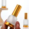 Frostat glaspump (spruta) Lotion Essential Oil Perfume-flaskor med brons guldlock 20 ml 30 ml 50ml