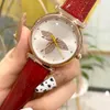 Marque de mode Regardez pour les femmes Lady Girls Crystal Flower Style Strap en cuir Quartz Wrist Watch L413397497