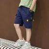 韓国の赤ちゃんの固体貨物ズボンの夏のショートパンツ緩い子供たちのショートパンツズボン服十代の12年210622