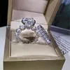 Nowa iskrzasta luksusowa biżuteria para pierścienie duże owalne cięte białe Topaz CZ Diamond Gemstones Kobiety Wedding Bridal Ring Set Prezent