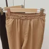 Été coton et lin femmes pantalons boutons taille haute Harem Vintage solide femme Chic pantalons poches 210428