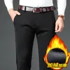 Pantaloni da uomo invernali di marca classici attillati dritti in pile elasticizzato spesso caldo business casual pantaloni slim a vita alta da uomo