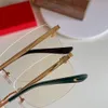 Uxury 디자이너 안경 광학 안경 표범 헤드 장식 프레임 림리스 안티 라운드 클래식 남성 여성 액세서리 패션 S2430