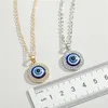 Naszyjniki Blue Evil Eye Luksusowy Kryształ Rhinestone Okrągły Wisiorek Naszyjnik Obojczyk Srebrny Złoty Choker Biżuteria Moda Urok Lucky Turkey Devil Eyes Świąteczne prezenty