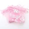 7x9cm Rosa Butterfly Bronzing Organza Smycken Populära Väskor Små Drawstring Pouches Pochette Tulle Bonbon 100pcs / Lot grossist