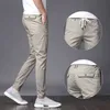 Льдяные шелковые штаны прямые трубки 2021 летние мужские брюки повседневные брюки тонкие тонкие корейские спортивные мужские брюки микро эластичные прямые X0705