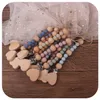 Natural Heart Wood Baby Pacifier Chain Silicone Dummy Holder Clips Food Grade Soother Newforn Teeth Practice Toys Tinging BEADS7869615