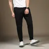 Gersri Nuovi modelli Pantaloni di qualità di fascia alta Jeans da uomo sottili Pantaloni casual quattro stagioni Tuta Nono pantaloni Pantaloni maschili taglie forti X0621