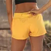 Snabb torr hög midja träningsport Running Solid Shorts Kvinnor Double Layer Fitness Träning med telefonficka 210724