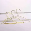 10pcs إبداع ملابس الحيوانات الأليفة رف خاص Cat Dog Home Home Pet Cored Gold Gold Metal Hanger 211029252C