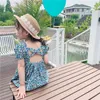 Odzież dziecięca Hurtownie Summer Koreański Backless Dress Dzieci Dziewczyna Kwiat Powrót Hollow-out Retro Bubble EURIOŚĆ I Styl amerykański