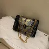 Moda feminina Bolsas carteiro de ombro serpentina Correntes Bolsa tiracolo Bolsas e bolsas de couro PU Designer de luxo