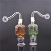 Skalle Shape Mini Glass Travel Bongs Inline Matrix Birdcage Perc Bubbler Bong Små rökning Vattenrör med oljestyrka och slang