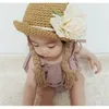 Vår sommar baby barn flicka sol block hatt strand hår pigtail fläta wig cap barn flickor blomma halm hatt keps ankomster 210713