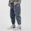 Ly Fashion Style japonais hommes jean coupe ample épissé concepteur jambe large Harem pantalon Streetwear Hip Hop Joggers Cargo pantalon