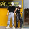 Tendance Hip Hop Harajuku pantalon mode caractères chinois imprimé ample jambe large femmes taille élastique décontracté rétro pantalon femmes Capris