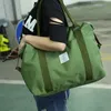ダッフルバッグ耐久性のある折りたたみナイロン旅行荷物ダッフルバッグ大容量女性パッキングキューブ女の子週末ポーチハンドバッグ