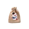 50 pcs Santa Claus Elk Bells Small Bear Drawstring Natural Burlap Bag Jute Presente Saco 10x14cm Algodão Rosto de Linho Impressão de Natal Saco 211216