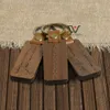 ファッションパーソナライズされたレザーキーチェーンペンダントビーチウォルナット木彫りキーチェーン荷物装飾キーリングディーファーザーデイギフト