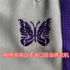 2020SS de agulhas de agulhas homens mulheres agulhas de veludo calças borboletas bordados sweatpants patchwork calças x0628