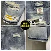 Herenjeans groothandel Koreaanse mode mannen casual bedelaar gat denim shorts merk bedrukte patch gescheurde korte broek