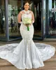 Arabski aso ebi 2021 luksusowa syrena seksowna sukienki ślubne kryształy koronkowe koronki Sheer Szyja Odłączona sukienki ślubne ZJ464