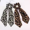 24pc / lot leopard print scrunchie kvinnor halsduk elastiska band båge gummi rep tjejer hårband tillbehör