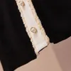 女性ニット冬の甘いパーティードレス長袖シングルブレストラップブラックホワイトミニドレス服210428