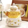 Teiera in ceramica con colino Porcellana vintage British Teiera e set di tazze Candela Riscaldamento Tazze da caffè in vetro Decorazione domestica 210724