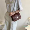 2021 New Ladies Small Square Bag Fashion Trend Shoulder Tinta unita Chain Messenger Pochette per cellulare