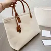 Abendtaschen große Einkaufstasche Lady Tote Leinwand Handtaschen Handtaschen Handtaschen Echtes Leder Top Klassiker Buchstabe gedruckter Griff Goldener Vorhängeschloss Reißverschluss Tasche