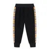 Barnbyxor Vår Höstflickor Sportbyxor 2022 Nya Sweatpants Striped Casual Middle and Small Children Trouser