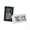 Huishoudelijke thermometers zwart / wit Mini Digitale LCD Milieu Hygrometer Vochtigheid Temperatuurmeter In Room Koelkastijsbox RH00512