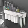 GUNOT porte-brosse à dents à adsorption magnétique distributeur de dentifrice mural boîte de rangement multifonction accessoires de salle de bain ensemble 210322