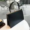 Cierre de vintage bolsos de mano de metal medio diseño de marco de alta calidad bolsas de asas de alta calidad otoño 2021 caja negra roja embalaje de la lona