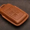 豪華な本物のレザーカーのキーケースジャガーXEL XFLペースXFオートアクセサリーキーチェーンホルダーバッグキーリングカウハイド2202282888887