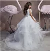 Nouvelles robes de filles de fleurs blanches pour robe de bal de mariage balayage train à volants en tulle robes de première communion petite fille princesse