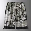 Casual Beach Shorts Homens Verão Poliéster Homens Roupas Bermudas Camufalge Drawstring Streetwear Shorts Homme Oversize M-4XL 210601