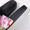 Pantofole eleganti di alta qualità Fashion Classics Sandali con diapositive Sandalo da donna da uomo di design con pantofola da spiaggia di marca stampata a forma di tigre fiore