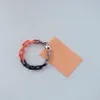 Europe Amérique Style Collier Bracelet Hommes Femmes Argent Noir Orangecouleur Métal Gravé V Initiales Motif Fleur Chaîne Épaisse 8772641